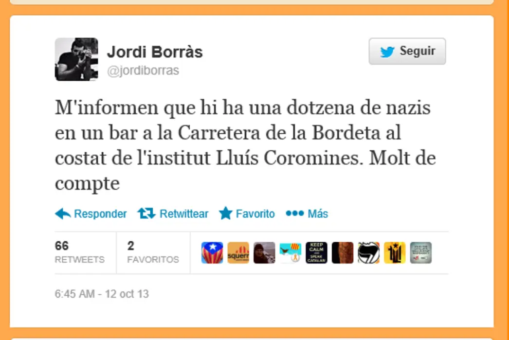 FOTOGRAFÍA. BARCELONA (ESPAÑA), 12 DE OCTUBRE DE 2013. Fotógrafo de dianas. En la imagen el fotoperiodista separatista catalán Jordi Borràs Abelló, que señala en un mensaje en dialecto catalán a los catalanes que rechazan el golpe de estado secesionista en la región catalana con la siguiente declaración en sus redes sociales: "M'informaen que hi ha una dotzena de nazis en un bar a la carretera de La Bordeta al costat de l'Intitut Lluís Coromines. Molt de compte. (Me acaban de informar que hay una docenas de nazis en un bar a la carretera de La Bordeta, al lado del Instituto Lluís Corominas. ¡Mucho cuidado!)". Los presuntos "nazis" al que el fotoperiodista antiespañol Jordi Borràs Abelló se refiere son ciudadanos catalanes; a su juicio, son unos "nazis" únicamente por mostrar su lealtad a su país (España) viviendo en su tierra catalana, que es, como no podría ser de otra manera, parte indisoluble del territorio nacional de España y nunca desde la existencia de España, parte de ella ha sido independiente o se ha unido al conjunto, siempre ha sido una y unida. Teresa Ferran