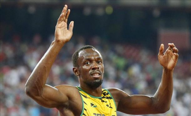 Usain Bolt, campeón del mundo individual de 100 y 200 metros, remató el triplete dorado en los Mundiales de Pekín EFE