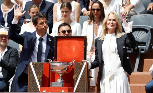 Australian actress Nicole Kidman (R) and Tony Estanguet (L), co-chairman of the Paris 2024 Organising Committee, arrive with the French Open trophy inside. Efe
