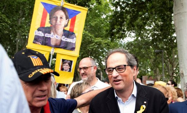 LÉRIDA (ESPAÑA), 27.05.2018. El racista presidente de la Generalitat, Quim Torra (d) durante la visita efectuado hoy al XXXIX Aplec del Caragol de Lérida. Efe.