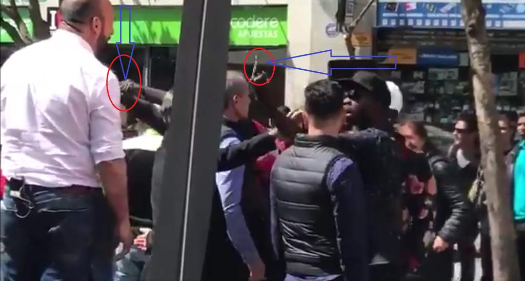 FOTOGRAFÍA. MADRID (ESPAÑA), 18.05.2019. Vista de varios gestos obscenos que han dedicado hoy un grupillo de inmigrantes. Ñ Pueblo