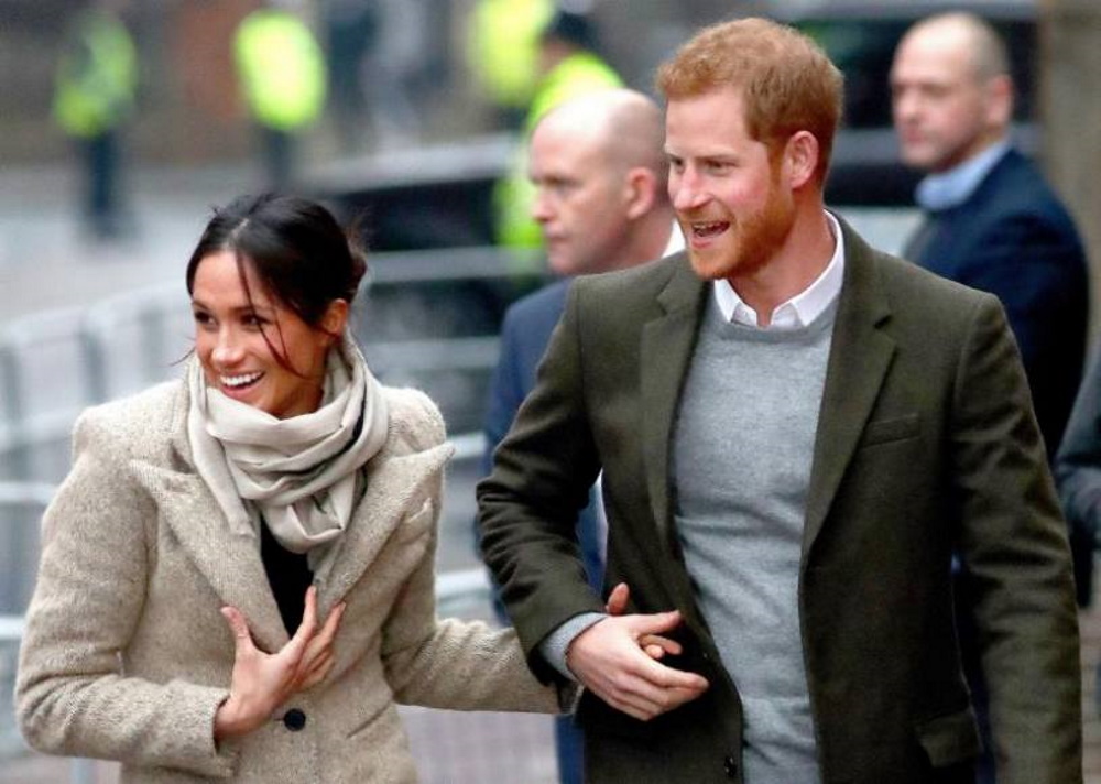 FOTOGRAFÍA. REINO UNIDO, AÑO 2020. En la imagen, los duques de Sussex, Enrique (d) y Meghan (i). Efe