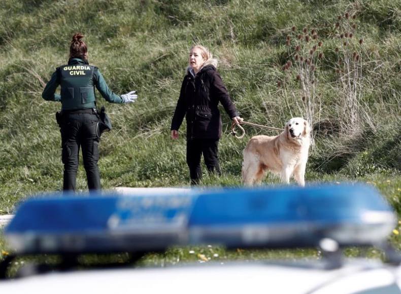 FOTOGRAFÍA. ESPAÑA, ESTADO DE ALARMA CON CONFINAMIENTO OBLIGATORIO A CASA POR CONTAGIO MASIVO DE CORONAVIRUS, 22.03.2020. Un efectivo de la Guardia Civil. Efe