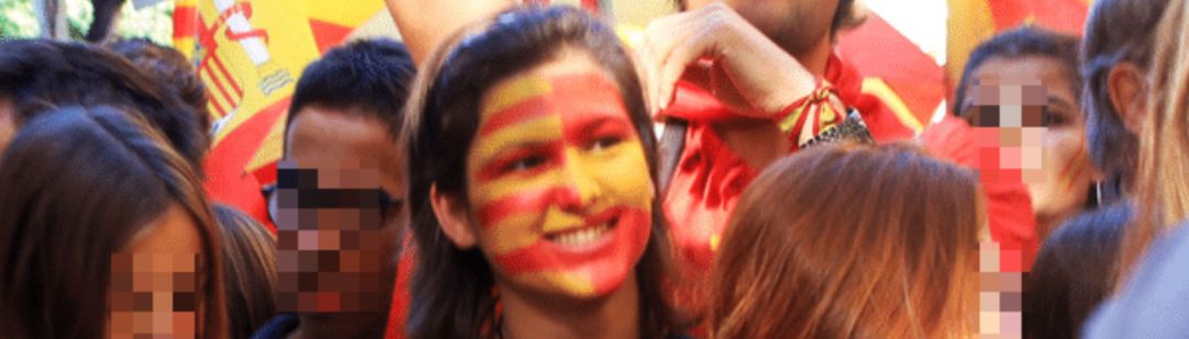 FOTOGRAFÍA. BARCELONA (ESPAÑA), 12.10.2019. Detalles de una joven catalana, exhibiendo su orgullo a la Nación española, con cara pintada de los colores de la bandera de su patria. Ñ Pueblo