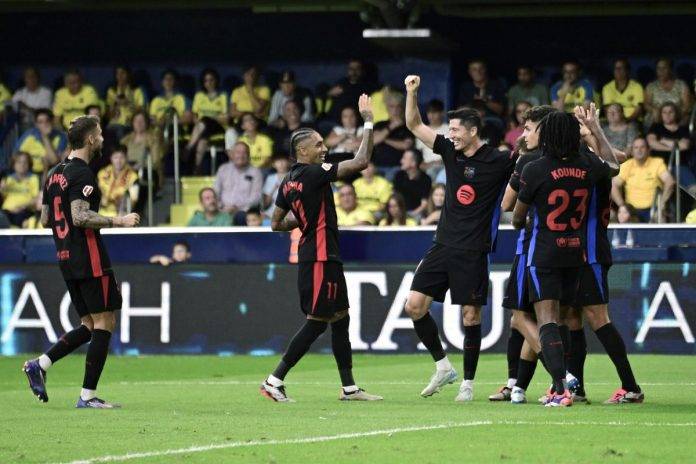 FOTOGRAFÍA. VILA-REAL (CASTELLÓN) COMUNIDAD VALENCIANA) REINO DE ESPAÑA, 22 DE SEPTIEMBRE DE 2024. El Barça muestra su mejor cara (1-5).- Los jugadores del FC Barcelona celebran el segundo gol del equipo barcelonista durante el encuentro correspondiente a la sexta jornada de Laliga EA Sports en el estadio de La Cerámica, en la localidad castellonense. Efe