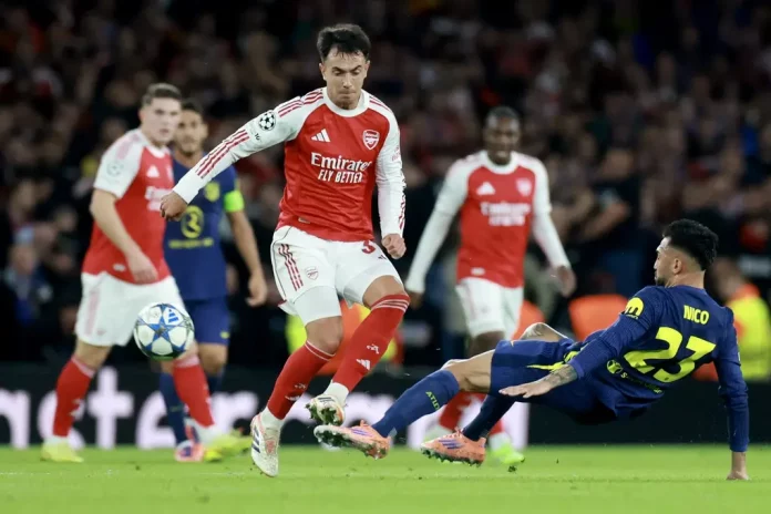 Arsenal pasa por encima del Atlético de Madrid (4-0) (2) FOTOGRAFÍA. LONDRES (REINO UNIDO), 21 DE OCTUBRE DE 2025. Martín Zubimendi Ibáñez (I), del Arsenal, y Nicolas Gonzalez, del Atlético, durante el partido de la UEFA Champions League que han jugado Arsenal FC y Atlético Madrid, en Londres, Reino Unido. Efe