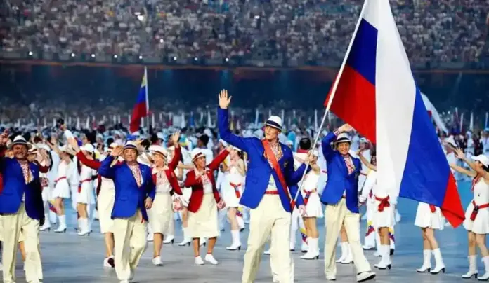 COI normalizará la participación de Rusia en los JJOO Los Ángeles 2028 (1) FOTOGRAFÍA. RÍO DE JANEIRO (BRASIL), 17 DE JUNIO DE 2016. COI normalizará la participación de Rusia en los JJOO Los Ángeles 2028. El dopaje deja a Rusia sin atletas en Río 2016. Los atletas y ex atletas rusos durante una ceremonia de apertura de los juegos olímpicos, en unas imágenes de rtve. Lasvocesdelpueblo (Ñ Pueblo).
