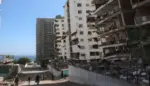 FOTOGRAFÍA. LA GUAIRA (VENEZUELA), 02 DE JULIO DE 2026. Venezuela:137 españoles desaparecidos, 11 bajo escombros y 27 fallecidos. Detalle de una imagen que muestra edificios afectados por el doble terremoto de magnitudes 7,2 y 7,5, este miércoles, en La Guaira (Venezuela). Efe