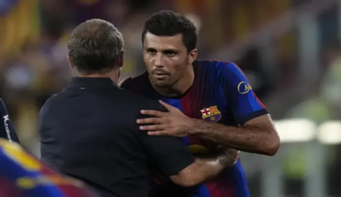 El Barça recibe a un Rayo Vallecano que busca su primera victoria, Rodrigo Hernández Cascante (Rodri) FOTOGRAFÍA. BARCELONA (CATALUÑA) ESPAÑA, 27 DE AGOSTO DE 2026. El centrocampista del FC Barcelona, Rodrigo Hernández Cascante (Rodri), saludando a Hans-Dieter Flick (Hansi Flick) al finalizar el partido de la primera jornada de LaLiga que FC Barcelona y Athletic Club de Bilbao disputaron en el Camp Nou. Efe